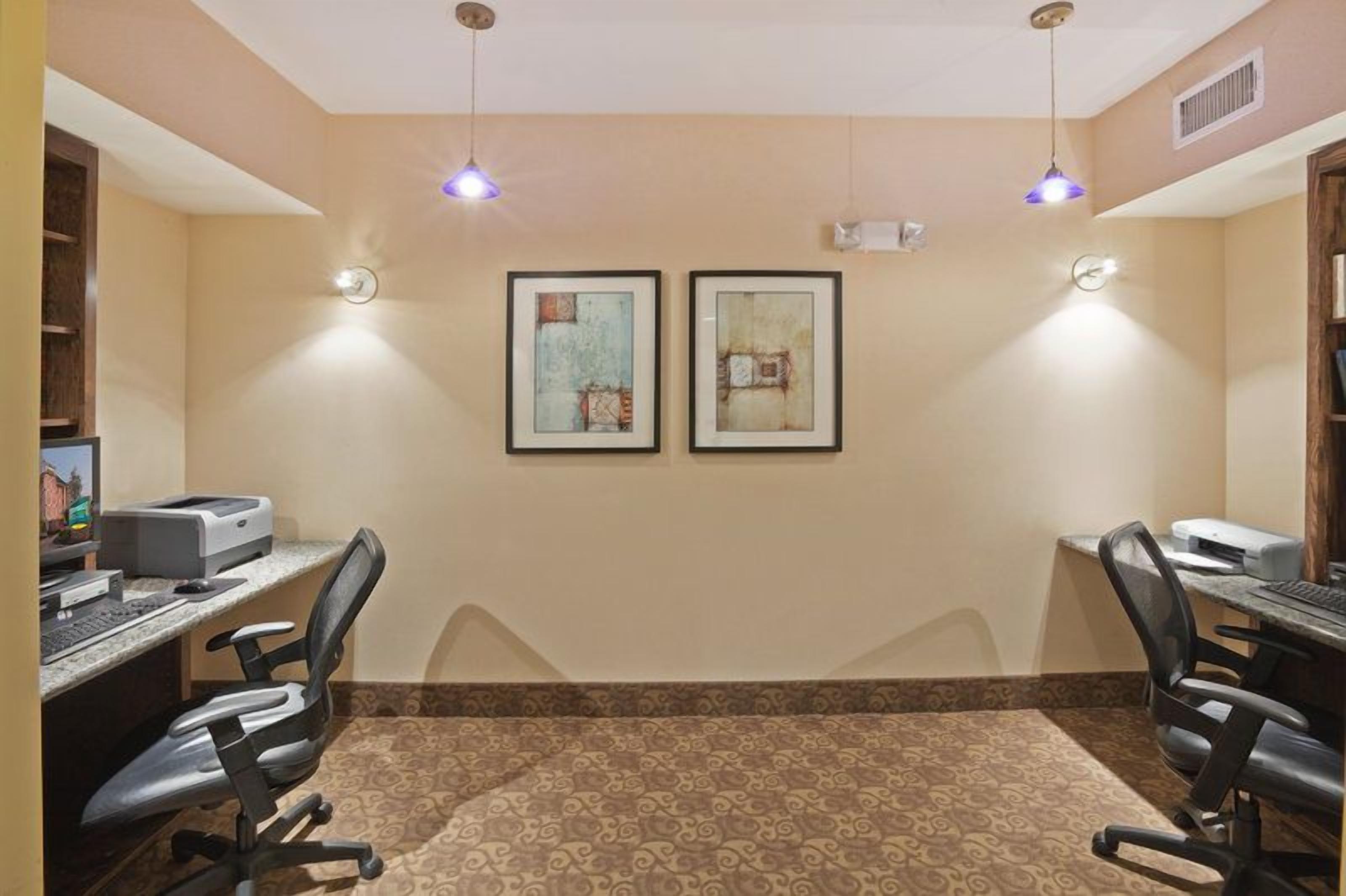 Business center with two workstations to stay productive