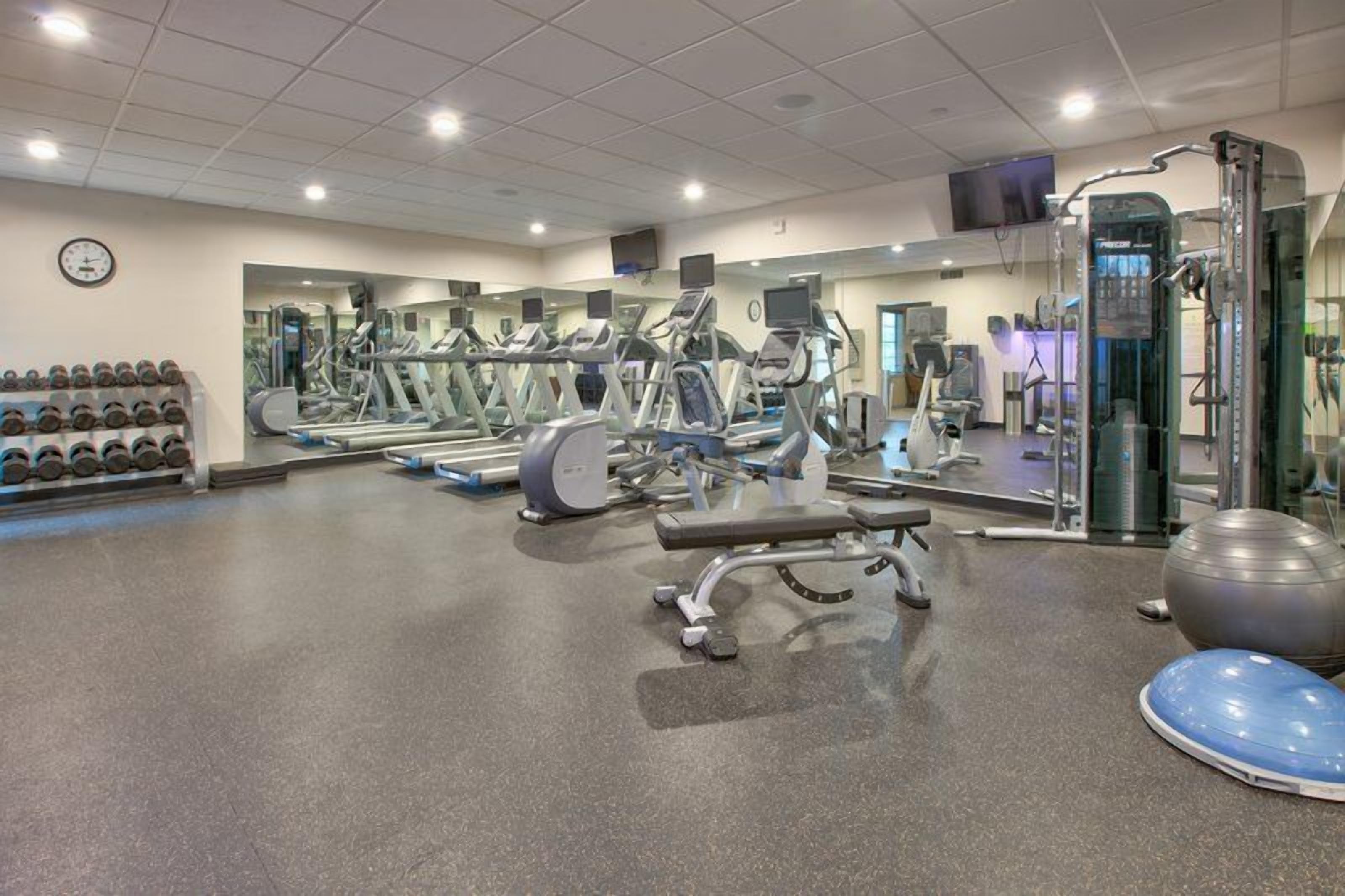 Fitness area with weight machines and cardio for a full workout