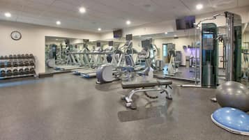 Fitness area with weight machines and cardio for a full workout