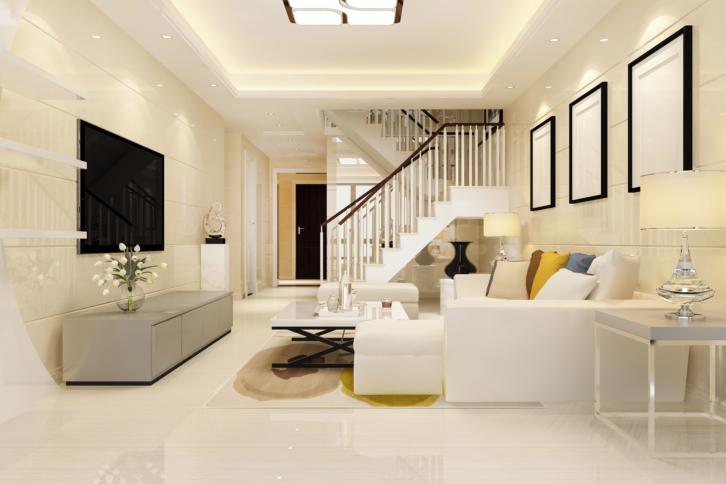 A modern living room with a sofa, coffee table, and a TV mounted on the wall.