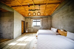 A bedroom with two beds, a wooden ceiling, a window with curtains, and a shelf with items. - H Villa YiLan (Dongshan)