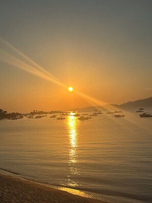 A sunset over a calm sea with boats. - New Listing (Grosseto-Prugna)