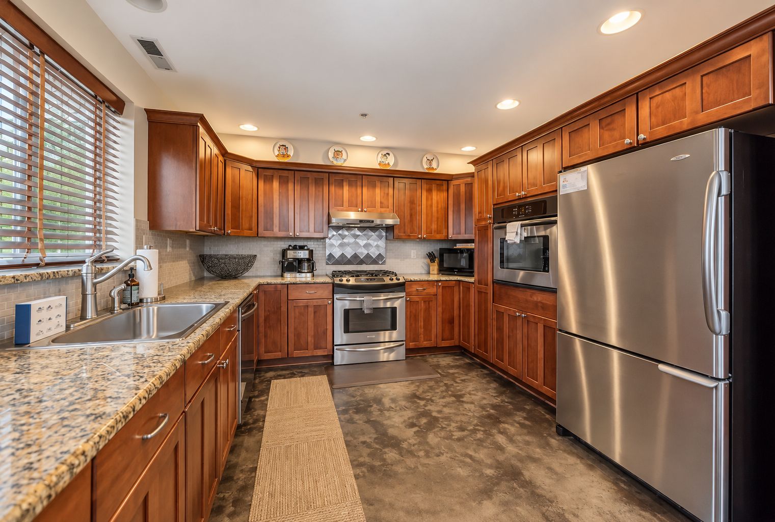 Spacious, modern kitchen fully loaded with everything needed for preparing snacks, appetizers, to full blown holiday meals.