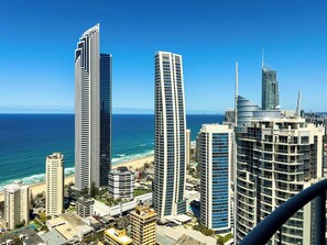 A cityscape with high-rise buildings, a beach, and the ocean. - Azure 41 Level 41 Ocean Views, Surfers (Surfers Paradise)
