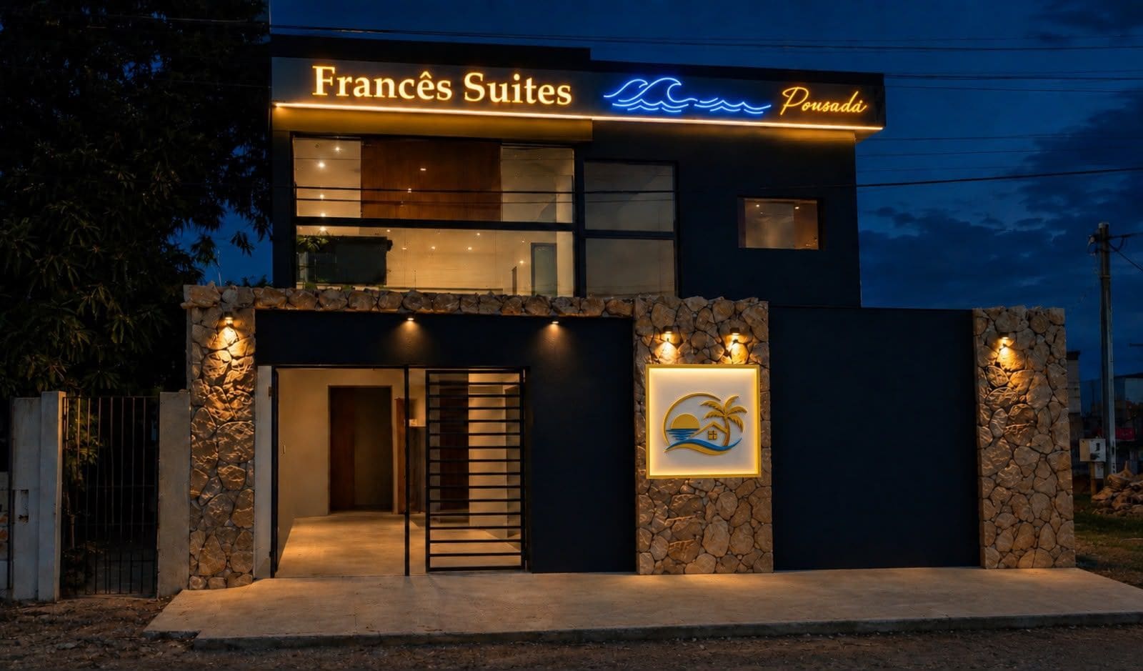 A building with a sign for 'Francès Suites' and a logo for 'Pousadi'.