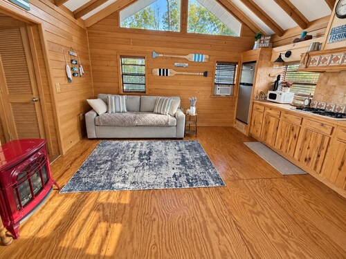 Peaceful Riverfront Cabin with Screened Porch & Fishing!