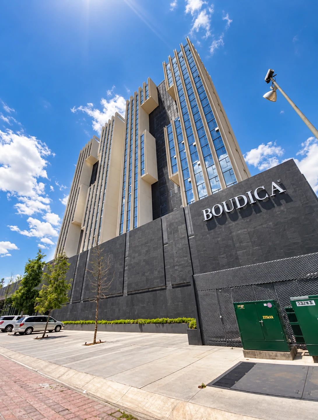 A modern building with a prominent sign reading 'BOUDICA'.