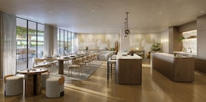 A modern interior with a dining area, bar, and kitchen. - Premier Studio | Brand New | Resort Pool + Gym | Near Beach | Nexo Miami (North Miami Beach)
