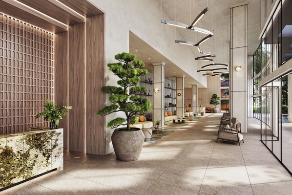 A modern interior with a long corridor, large potted plants, and contemporary furniture. - High Floor Signature Suite | Brand New | Resort Pool + Gym | Nexo Miami (North Miami Beach)