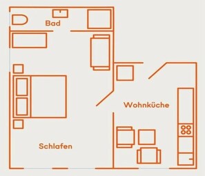A floor plan with labeled areas: 'Bad,' 'Wohnk\u00fcche,' and 'Schlafen.' - Holiday apartment in Juist with swimming pool (Juist)