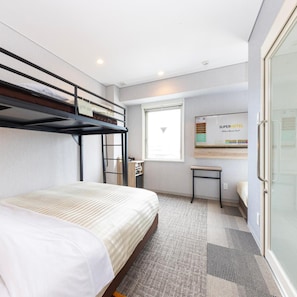A hotel room with a bunk bed, a desk, a chair, a window, and a wall-mounted information board. - Super Hotel Shiga Nagahama Tennen Onsen (Nagahama)
