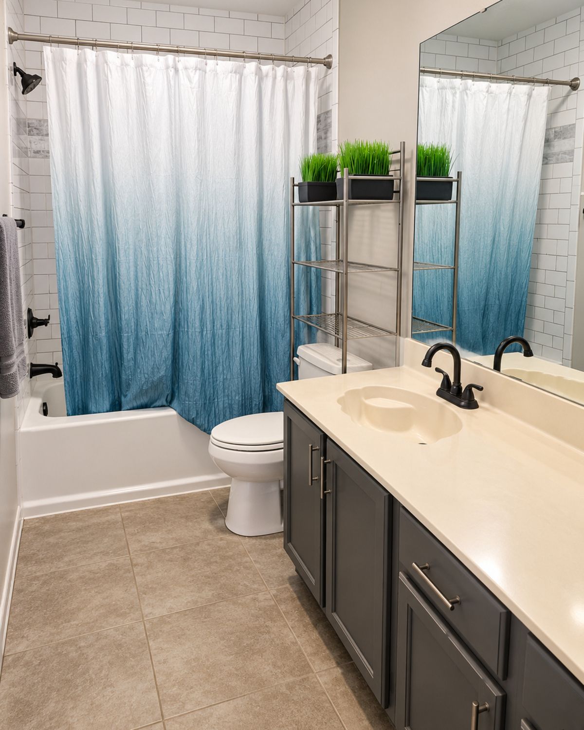 A bathroom with a bathtub, toilet, and sink.