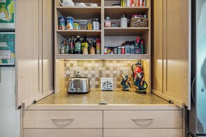 Well stocked kitchen - Large spacious home with 3 suites, views, large decks, steps to the beach (Manzanita)