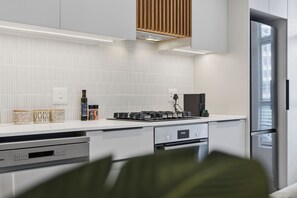Private kitchen - Luxe Modern Apartment | Ocean Views | Aircon (Umhlanga)