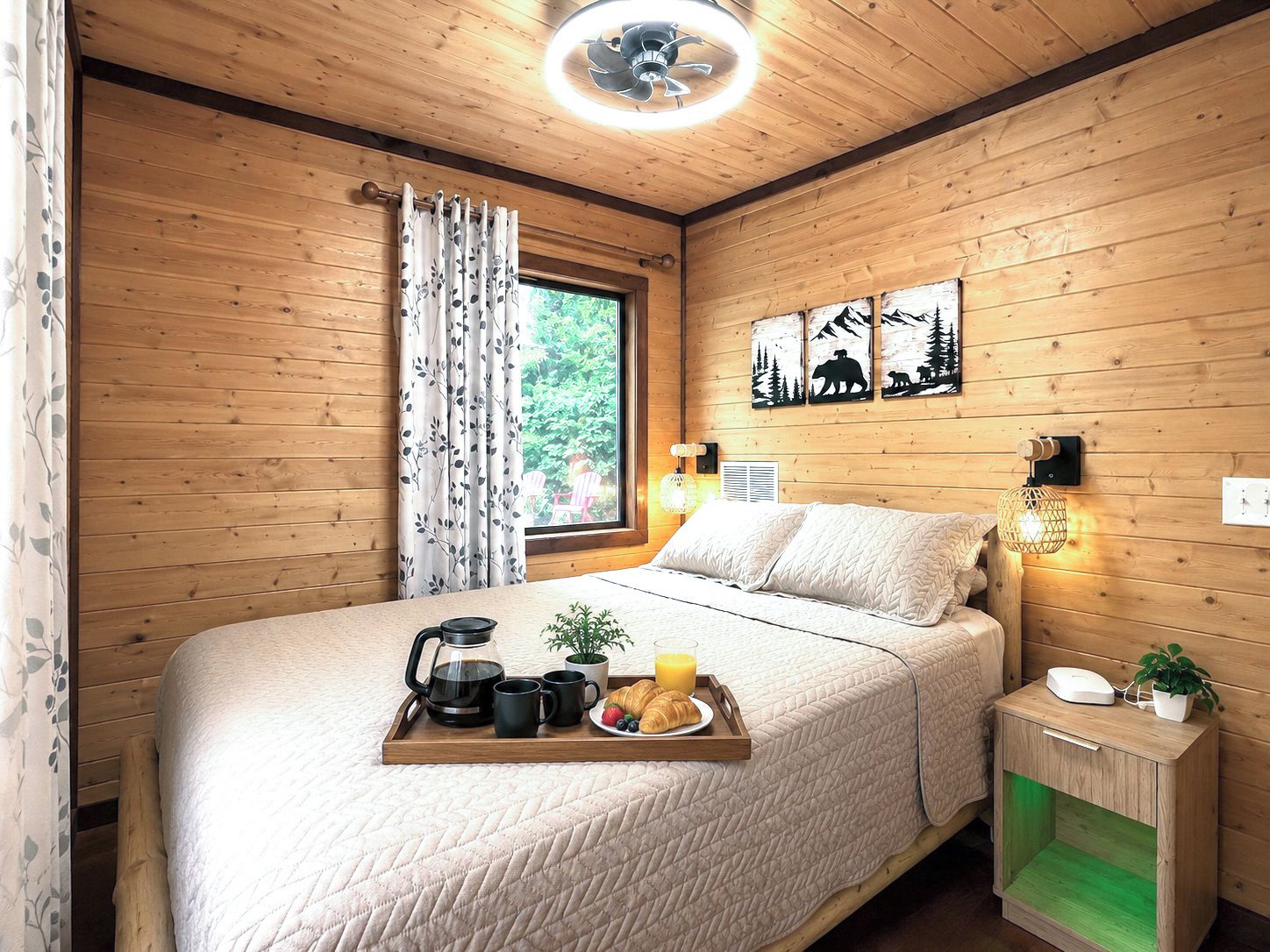 A cozy wooden room with a bed, a bedside table with a lamp, and a window with curtains.
