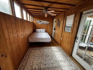 A bedroom with a bed, a ceiling fan, and a patterned rug. - La Jolla Coastal Retreat Walk to the Beach, Dining and Designated Parking (San Diego)