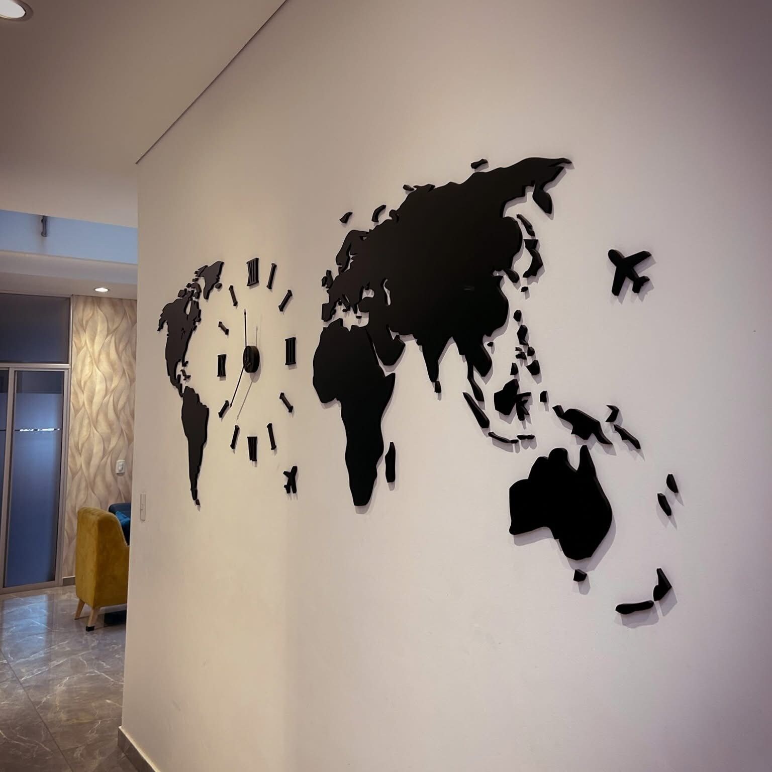 A wall with a world map design.