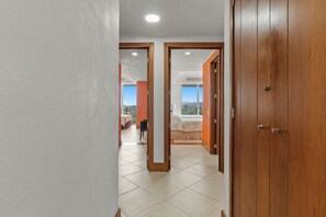 A hotel corridor with a view of a balcony and a bedroom. - Grand Venetian Oceanview Penthouse (Puerto Vallarta)