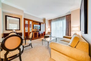 A hotel room with a living area, a dining area, and a kitchenette. - 1 Bedroom Vista balcony Collection at MGM SIGNATURE StripSuite Hotel & Resort - NO RESORT FEE (Las Vegas)