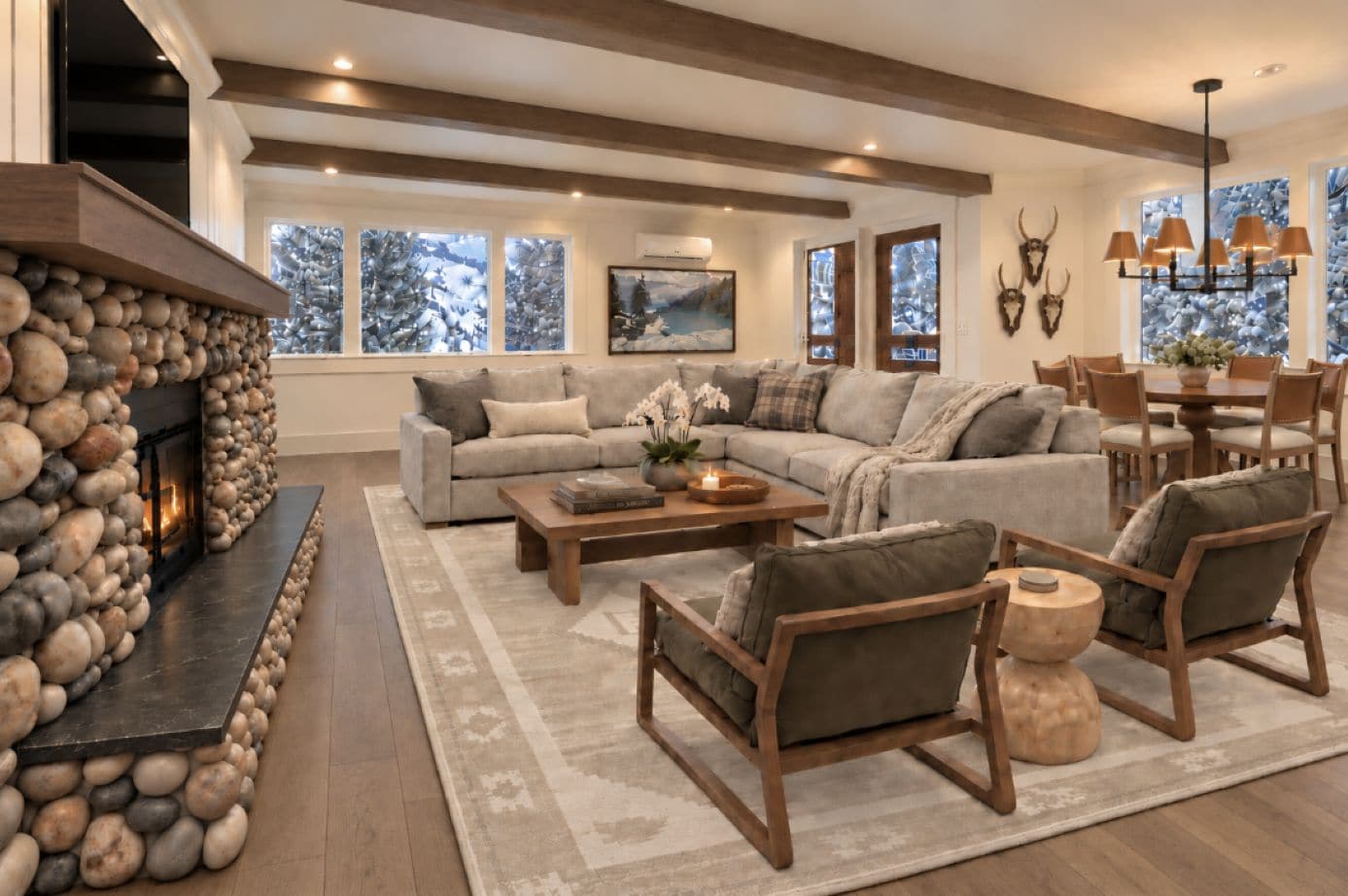 Proposed living room renovation rendering with new furnishings, engineered flooring and an updated fireplace wall. Renderings closely reflect the intended final design. Renovation completion expected mid-November 2026.