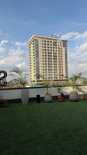 A high-rise building with a sign reading 'Marriott Executive Apartments.' - Modern 1 bedroom Westlands Nairobi (Nairobi)