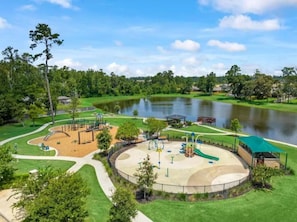 A park with a playground, a lake, and a pavilion. - Harry Potter Thematic Bedroom | New York Game Room | Backyard (Magnolia)
