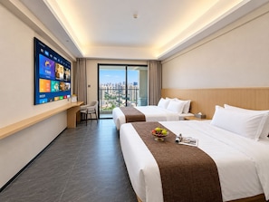 A hotel room with two beds, a desk, a TV mounted on the wall, and a view of the city through the window. - Dongfeng Shanhai Serviced Apartment (Shenzhen)