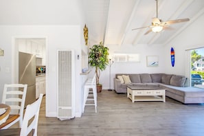A modern living space with a kitchen, dining area, and seating area. - Short Walk To Sand Prefect For Families, Lrg Patio (Newport Beach)