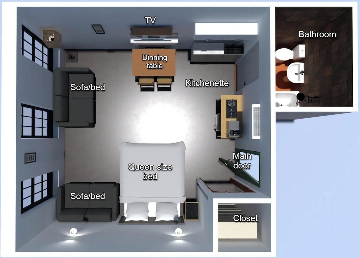 A hotel room layout with a queen size bed, sofa, dining table, kitchenette, TV, main door, and closet.