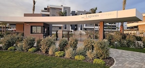 A modern building with a sign reading 'Lagoons village by TM'. - Lagoons Village Tm Torrevieja (Torrevieja)