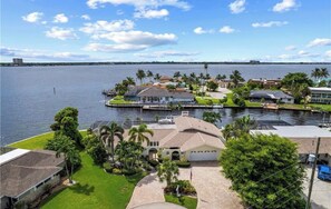 Exterior - Stunning 4-Bedroom Riverfront Retreat with Private Hot Tub & Heated Pool! (Cape Coral)