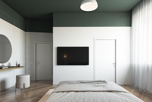 A modern bedroom with a bed, a mounted TV, a mirror, and a door. - MAIN Exclusive Apartments - Toledo (Napoli)