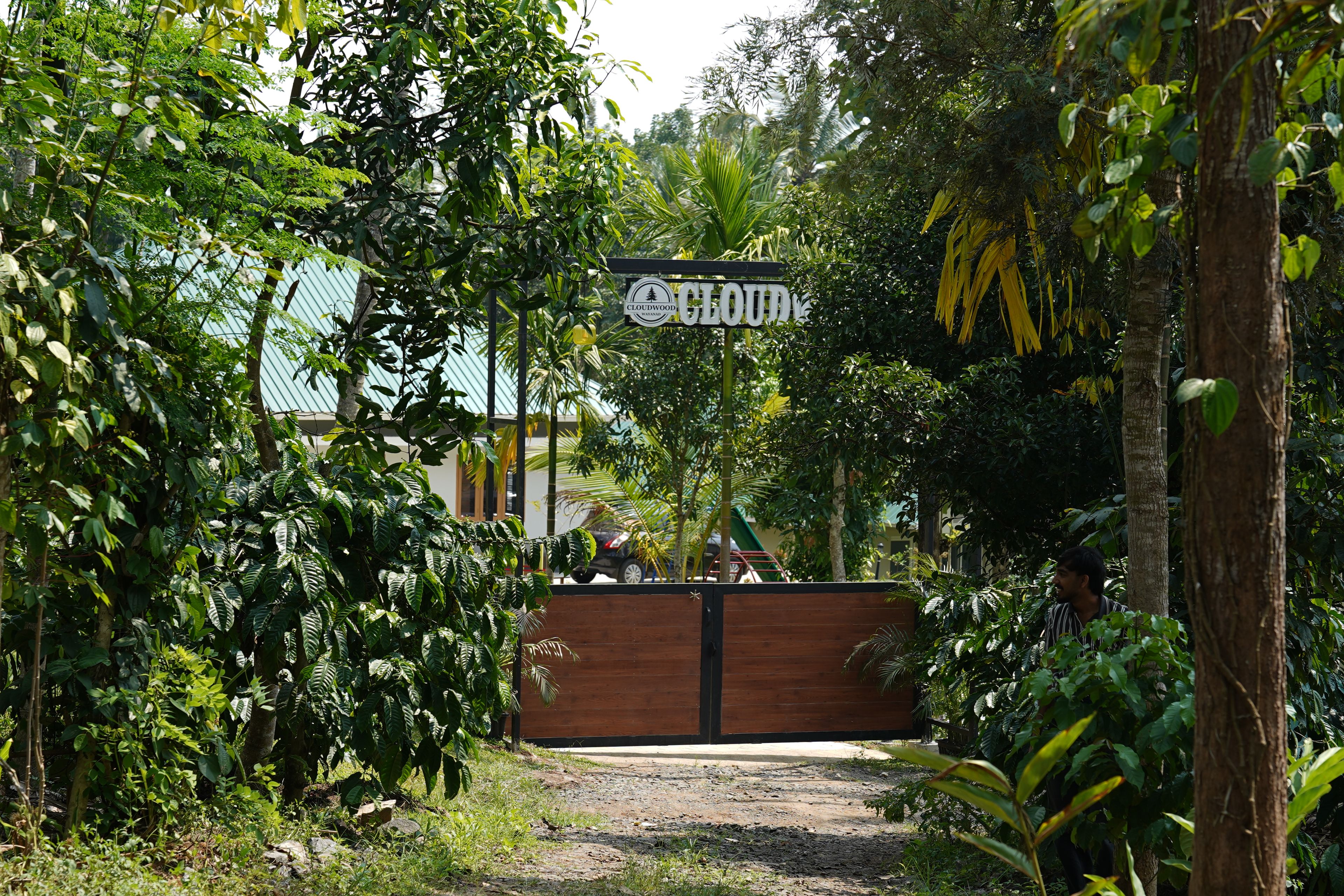 A gated entrance to a property named 'Cloudwood.'