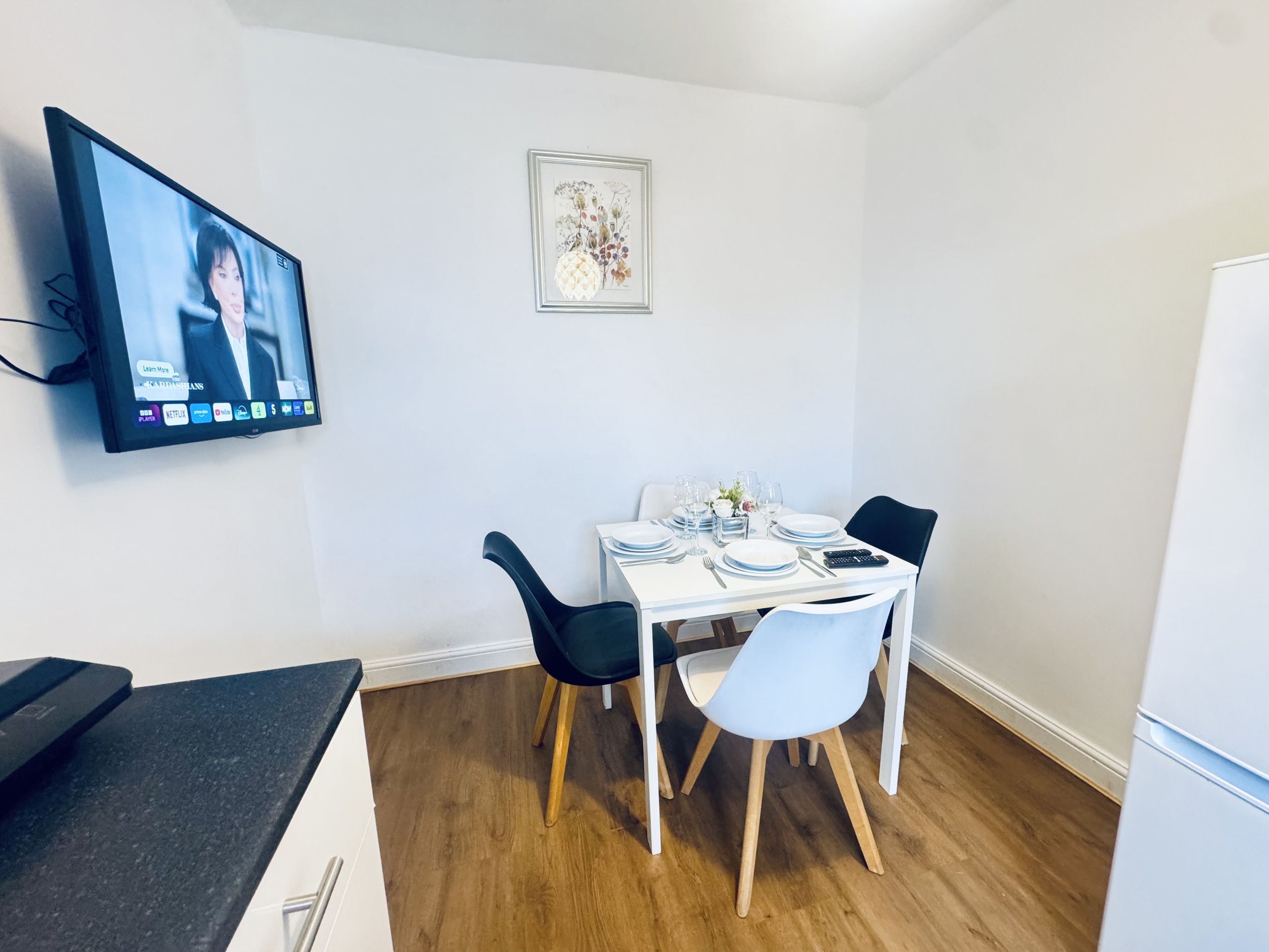 Spacious dining area and fully equipped kitchen for your convenience.
