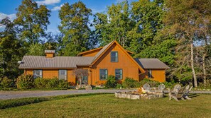 A two-story wooden house with a sloped roof, surrounded by a well-maintained lawn and trees. - NEW! Alpine Lodge | Large Home on 5 Acres | Near Alpine Camp & DeSoto State Park (Mentone)