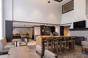 A modern bar area with seating and a coffee station. - 2-Double 1BR Suite w/ Daily Breakfast Incl. + Pool (Dublin)