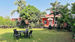 Outdoor dining - Peaceful 4-bedroom farmhouse with AC and private pool near Manesar (Tauru)