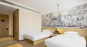 A hotel room with two beds, a cityscape mural, and a door leading to another room. - City Comfort Inn Liuzhou Liucheng People Square (Liuzhou)