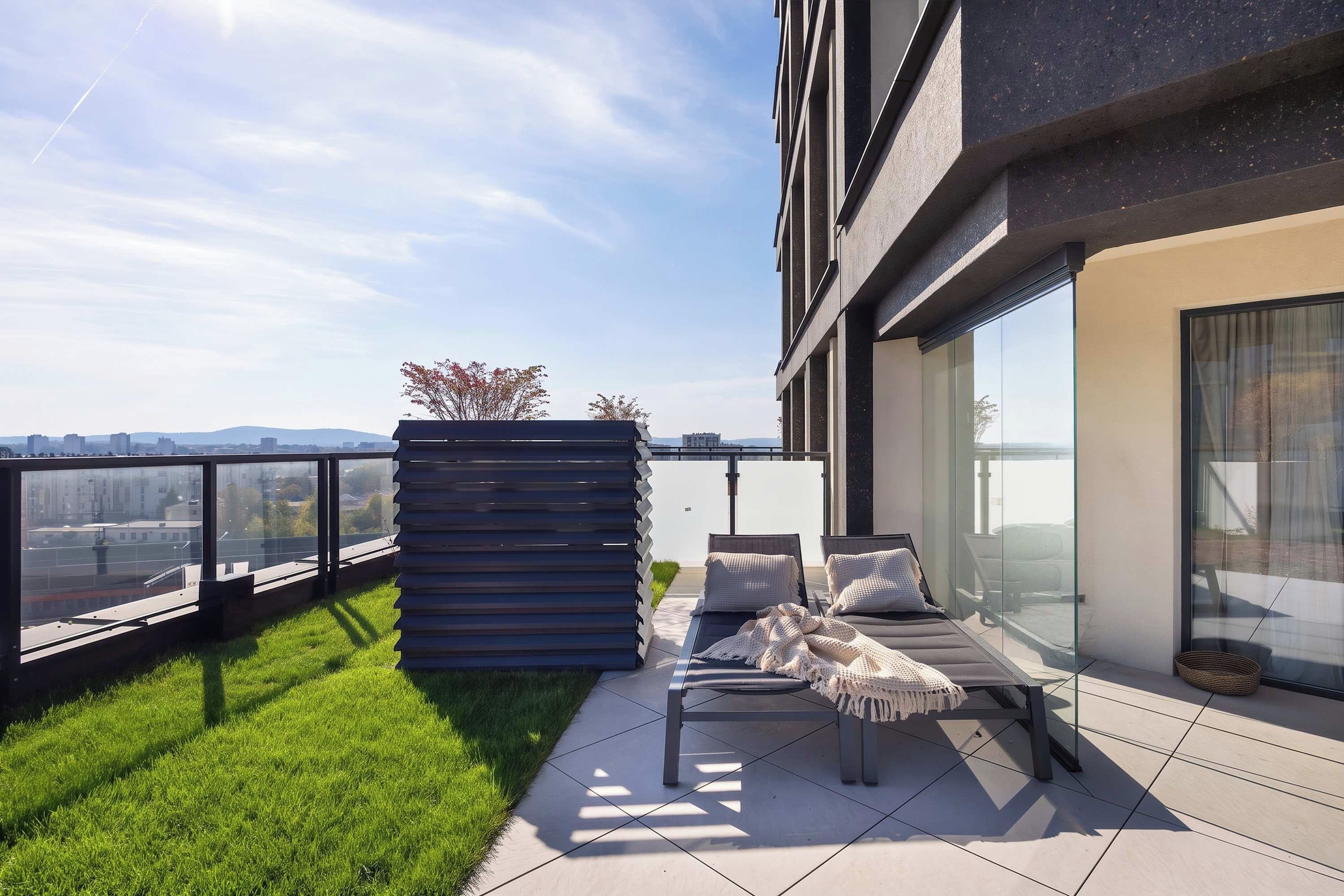 A modern outdoor seating area with a view of the cityscape.