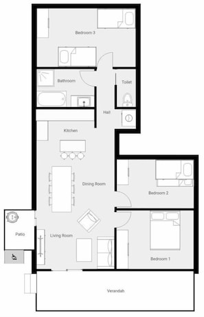 Een plattegrond toont drie slaapkamers, een keuken, een eetkamer, een woonkamer, een badkamer, een toilet en een terras.