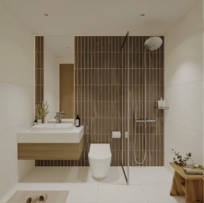 A modern bathroom with a wooden vanity, a white toilet, and a shower area. - Elyra Hotel Phu Quoc  (Phu Quoc)