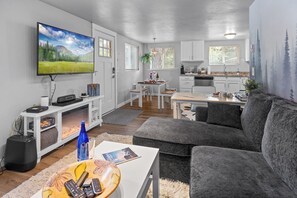 Living area - Cozy 1-bedroom cottage in C Falls with HOT TUB and AC. 20 min from Glacier NP (Columbia Falls)