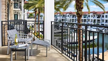 Furnished balcony with seating and marina view