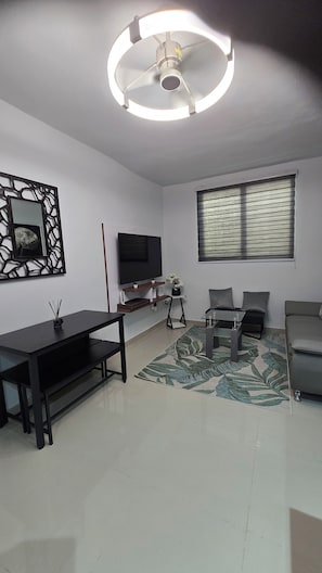 Living area -  New Cousy boutique apt 2-bedroom with AC WIFI  in San Juan close to everything (San Juan)