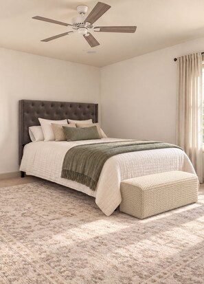 A bedroom with a bed, a ceiling fan, a window with curtains, and a textured rug. - Lakewood Manor, near Massanutten Resort (Harrisonburg)
