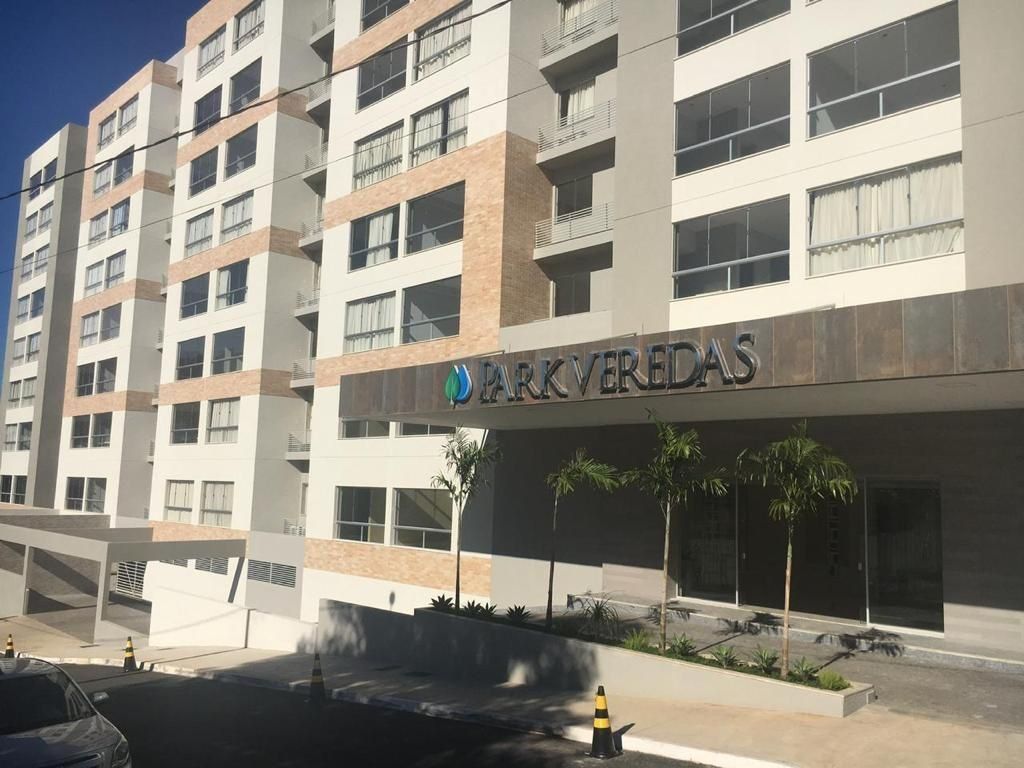 A multi-story building with a sign reading 'Park Verras.'