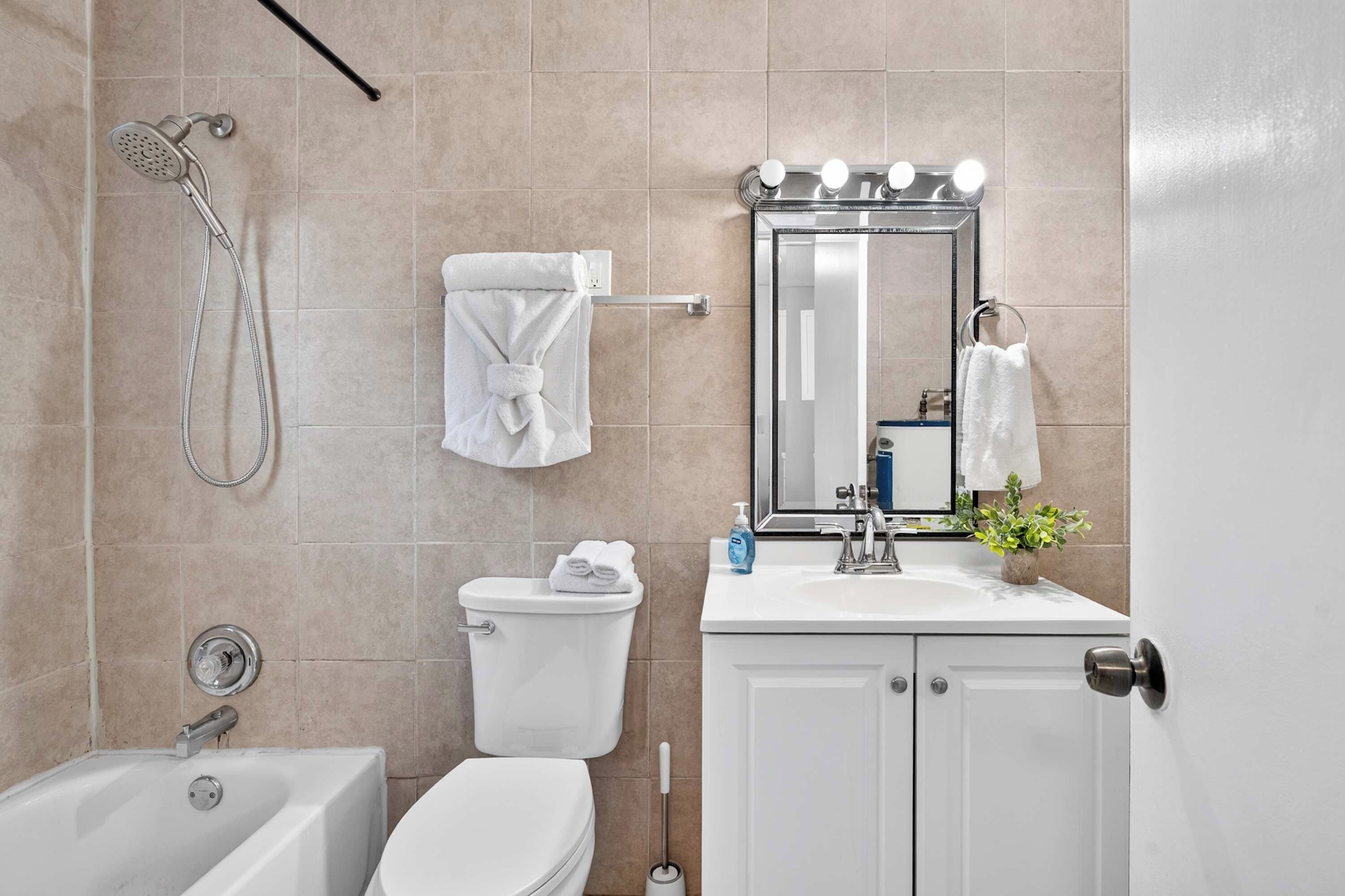 Full. Bathroom 1: Freshen up in this clean and inviting full bathroom, offering a comfortable space to start your mornings or unwind with a refreshing shower after a long day.