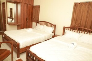 Room - Nilgiri Woodlands Service Apartments (Mysuru)