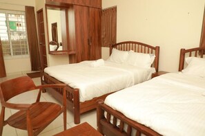 Room - Nilgiri Woodlands Service Apartments (Mysuru)