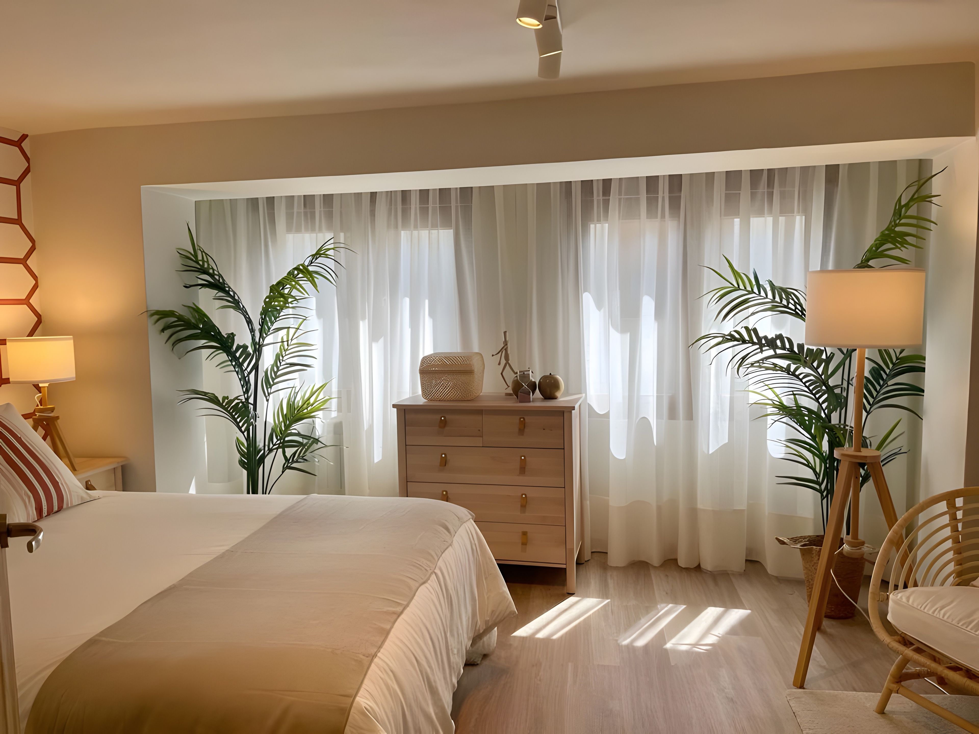 Un dormitorio con una cama, un aparador, una lámpara y dos plantas en macetas.